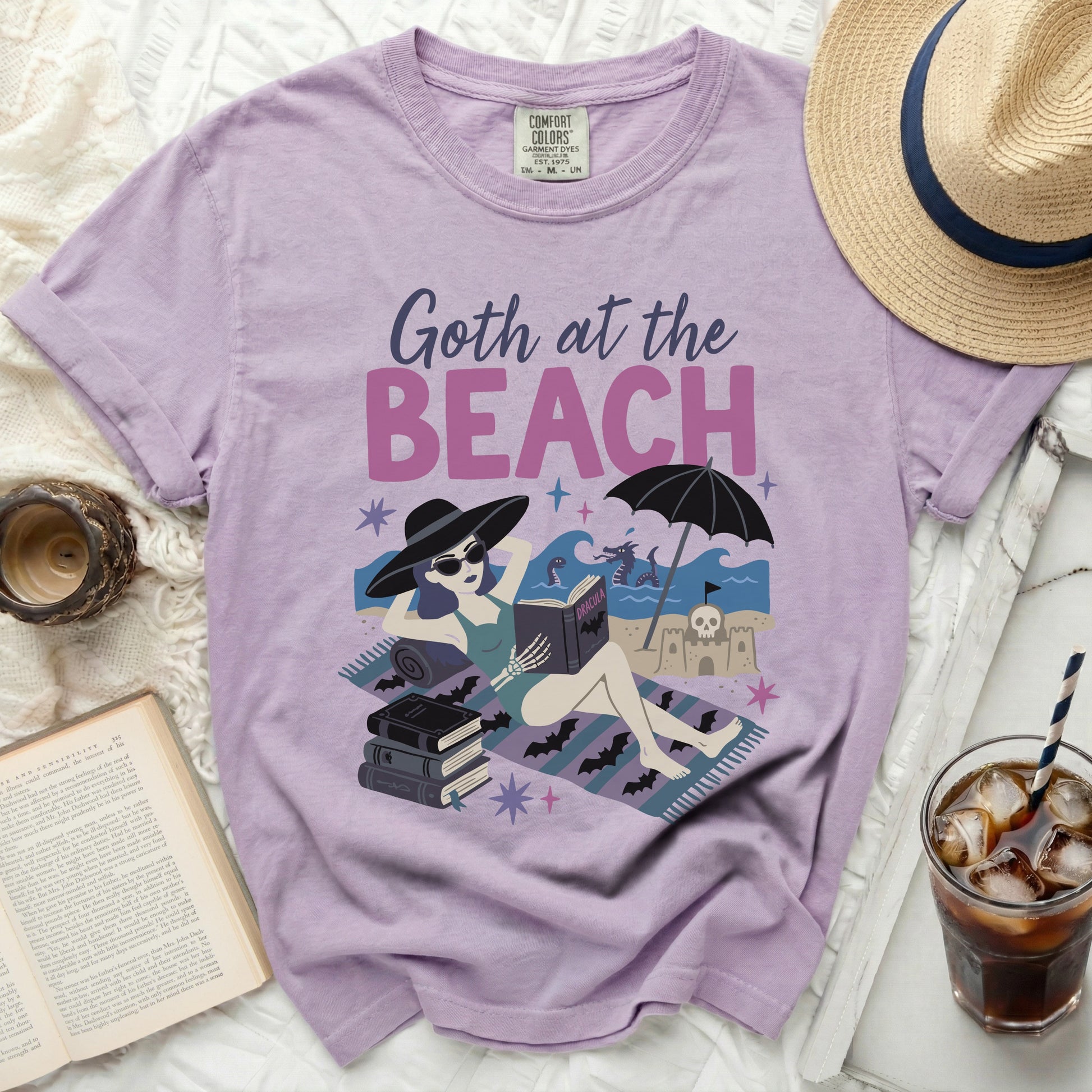 Lilac t-shirt with "Goth at the Beach" text and Dracula illustration.