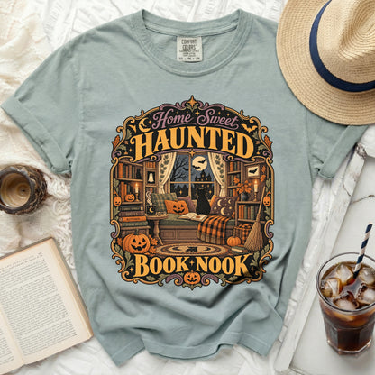 T-shirt graphic with "Home Sweet Haunted Book Nook" text and Halloween elements.