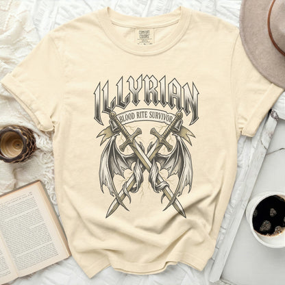 Illyrian Blood Rite Survivor graphic on a cream t-shirt.