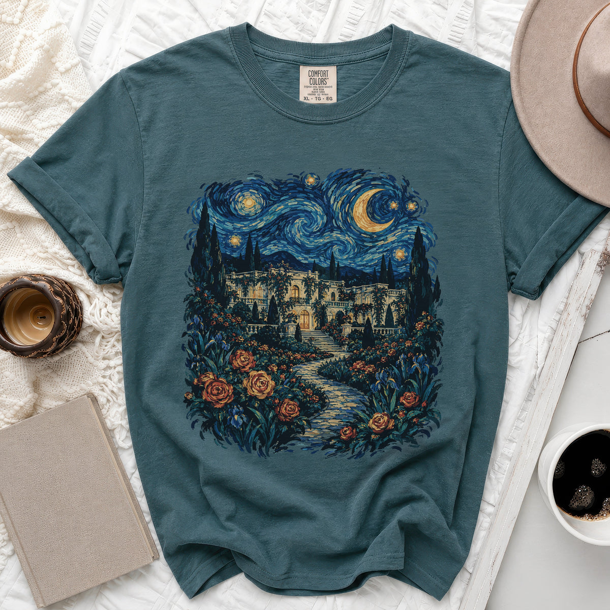 Teal t-shirt with Van Gogh-inspired starry night and mansion print, size XL.