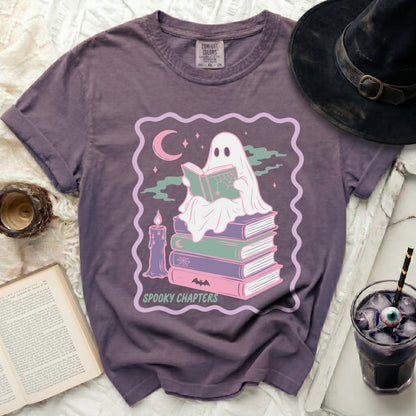 Ghost reading book on stack of books with text Spooky Chapters.