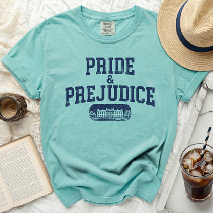 Aqua t-shirt with "PRIDE & PREJUDICE" and a building graphic.