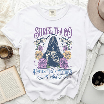 White t-shirt with "Suriel Tea Co" and a skeleton holding a teacup.