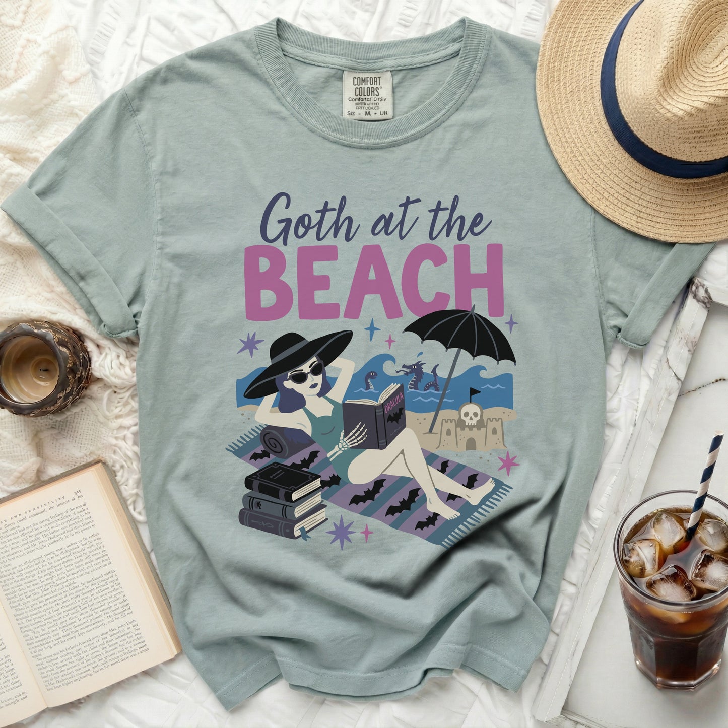 Comfort Colors t-shirt with "Goth at the Beach" graphic and Dracula book.