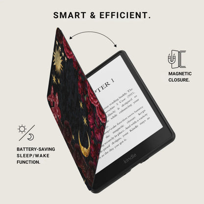 Kindle with a dark floral case featuring sun and moon details, open to show screen.