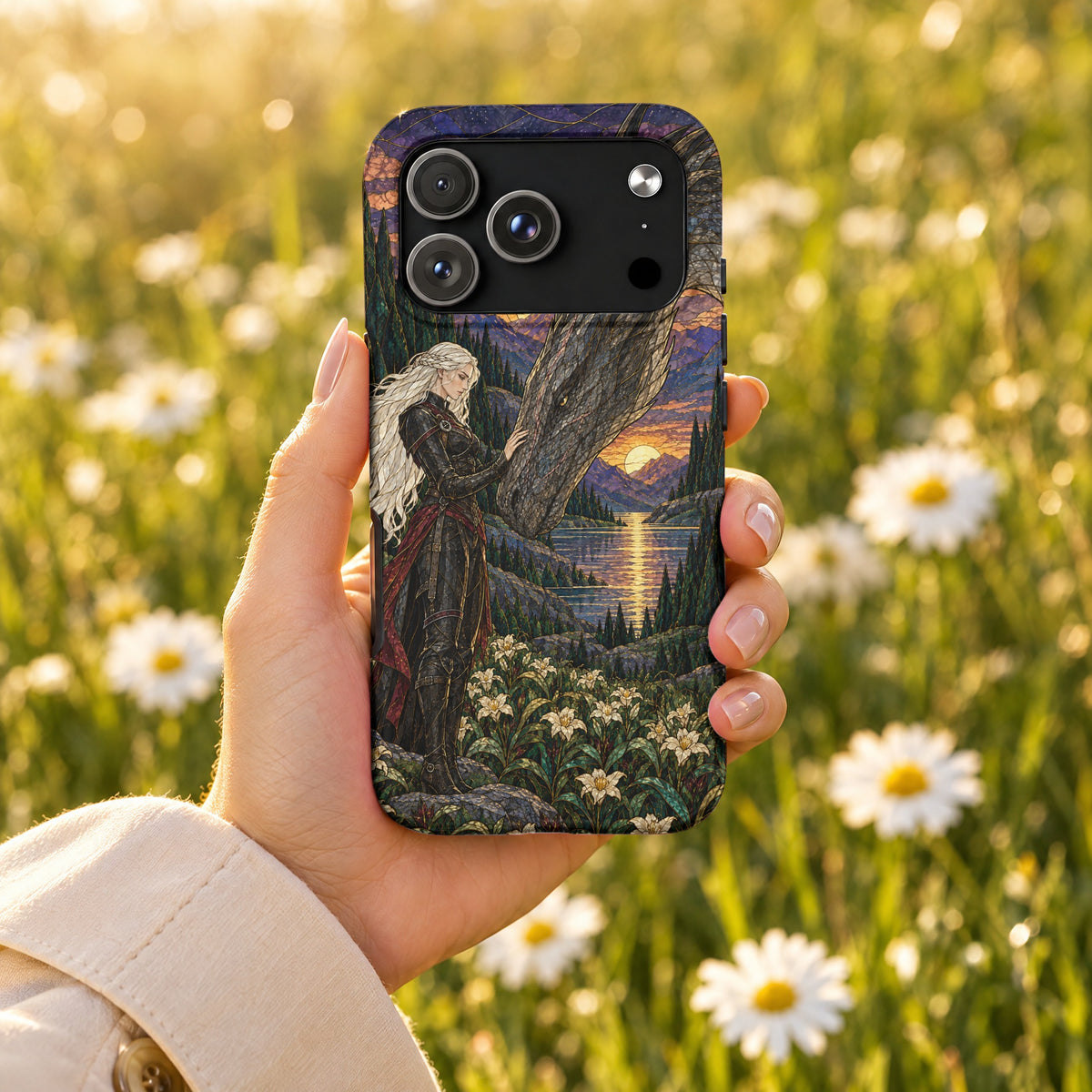A hand holds a smartphone featuring a fantasy art case depicting a woman and a dragon.