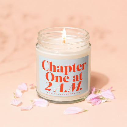 Candle with "Chapter One at 2 A.M." text and scattered pink petals.