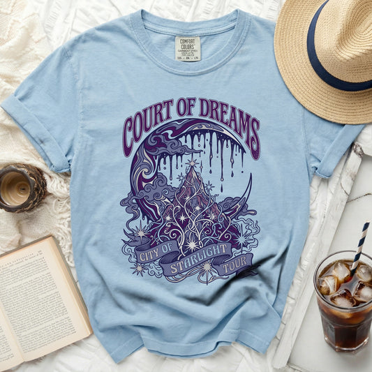 Light blue t-shirt with "Court of Dreams City of Starlight Tour" graphic.