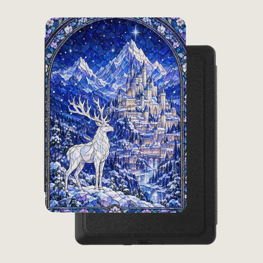 A black e-reader features a blue stained-glass style front cover depicting a stag before a castle and mountains.