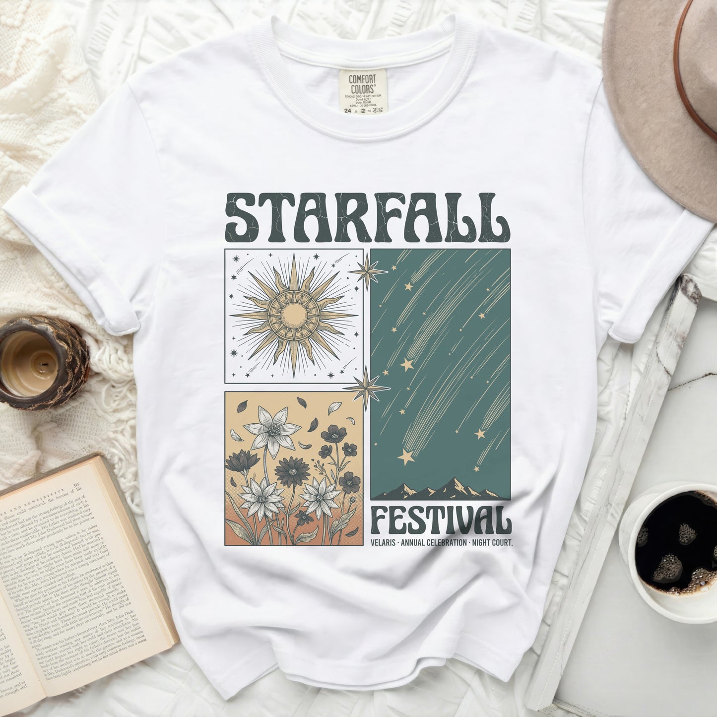White t-shirt with "Starfall Festival" graphic featuring sun, flowers, and shooting stars.