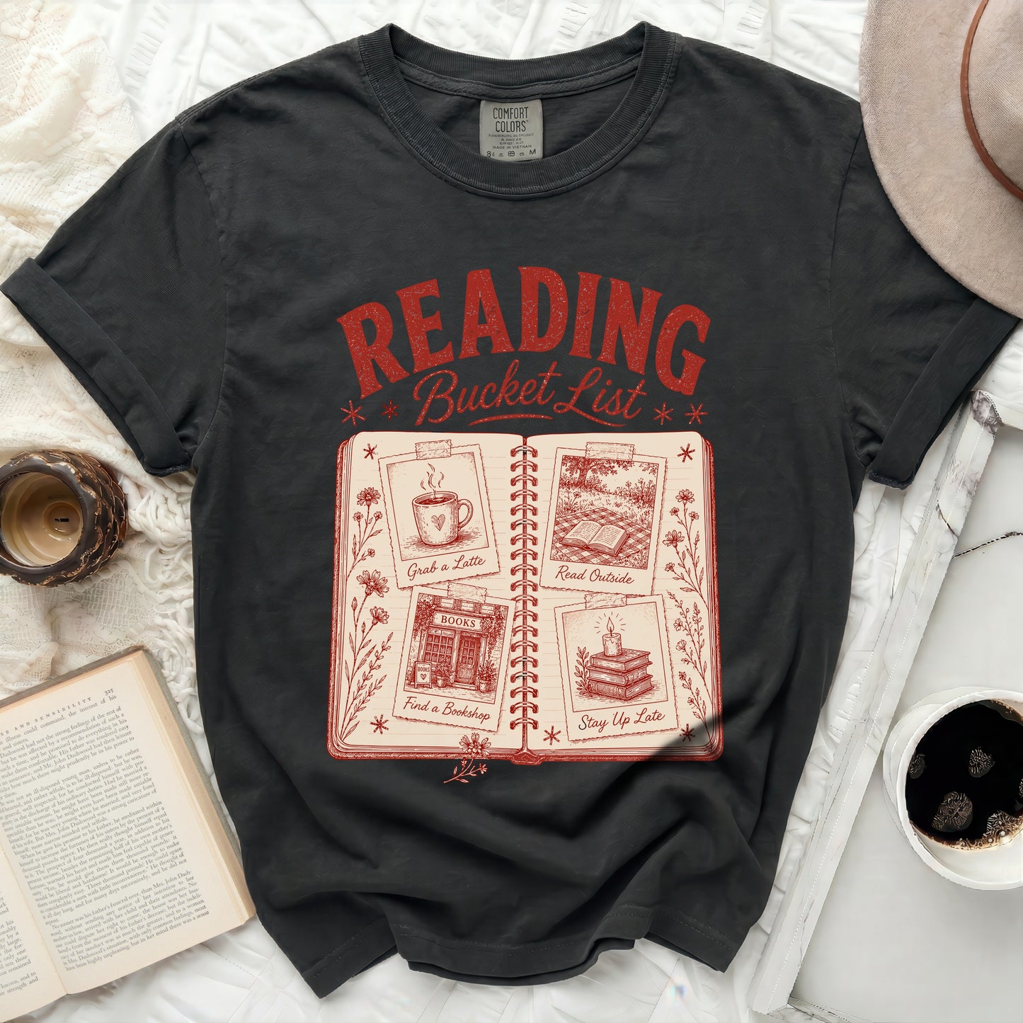 Comfort Colors black t-shirt with "Reading Bucket List" graphic.
