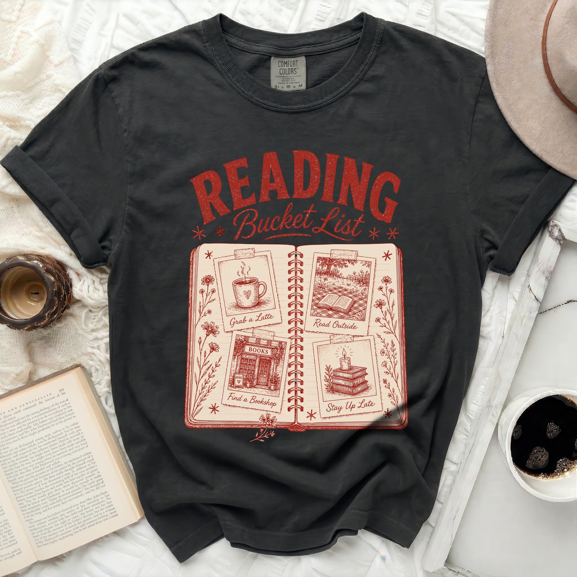 Comfort Colors black t-shirt with "Reading Bucket List" graphic.
