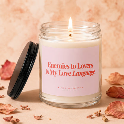Candle with pink label reading "Enemies to Lovers Is My Love Language."