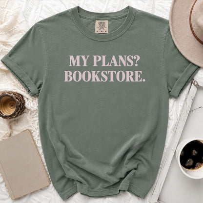 Green t-shirt with pink text that reads "MY PLANS? BOOKSTORE."