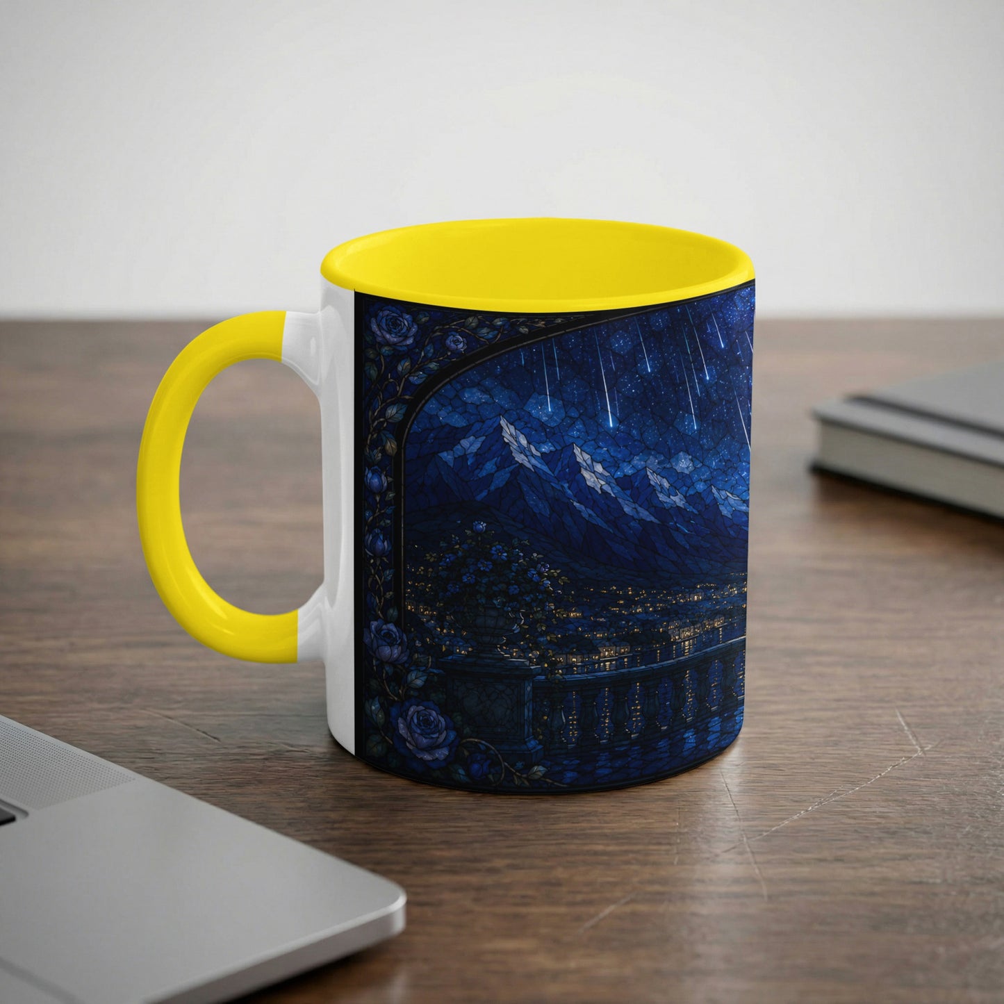 White mug with yellow handle featuring a stained-glass style night scene of a city.