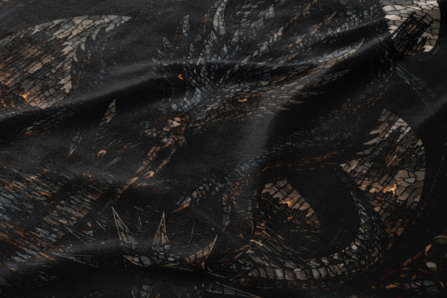 Dark grayscale fabric print featuring a fierce dragon with glowing yellow eyes.