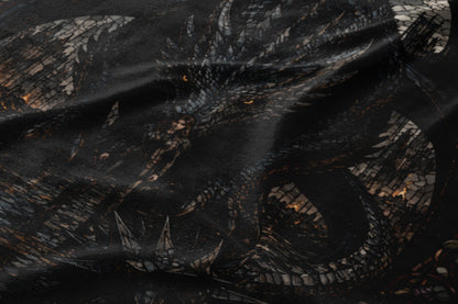 Dark grayscale fabric print featuring a fierce dragon with glowing yellow eyes.