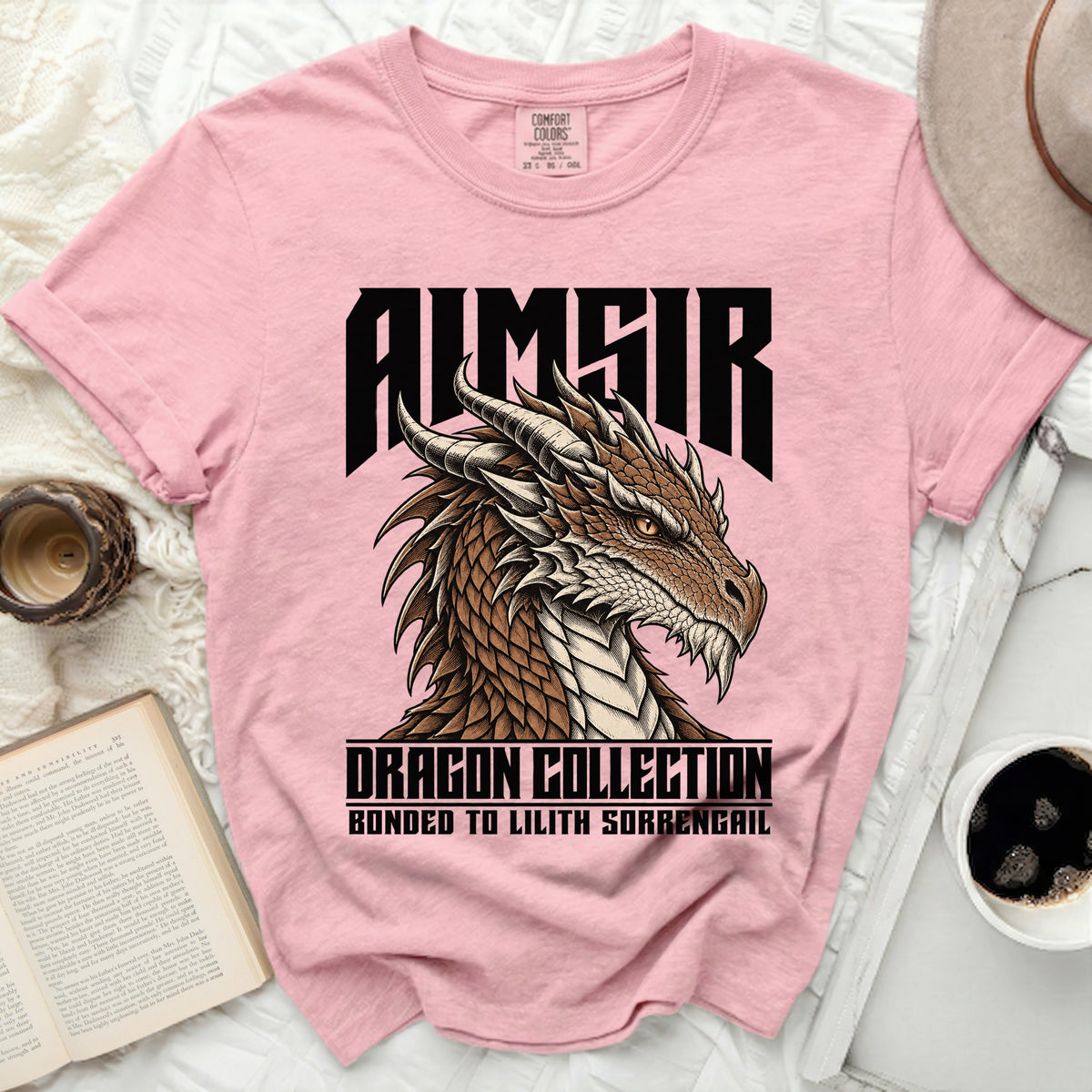 Pink t-shirt with Aimsir dragon head and text "DRAGON COLLECTION BONDED TO LILITH SORRENGAIL".
