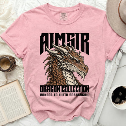 Pink t-shirt with Aimsir dragon head and text "DRAGON COLLECTION BONDED TO LILITH SORRENGAIL".