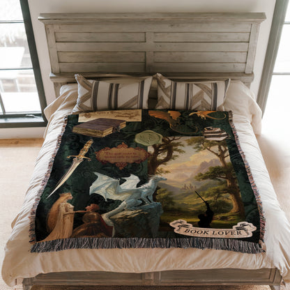 a bed with a large, colorful blanket that has a fantasy-themed design. The blanket includes a dragon, a woman, and a castle, creating a whimsical and imaginative scene.