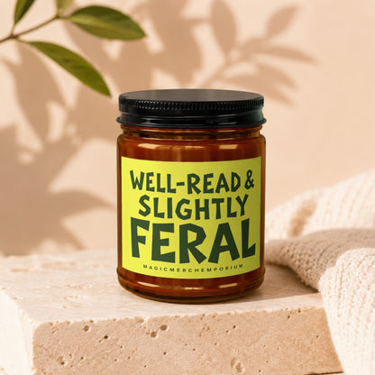 Amber jar candle with "Well-read & Slightly Feral" label.