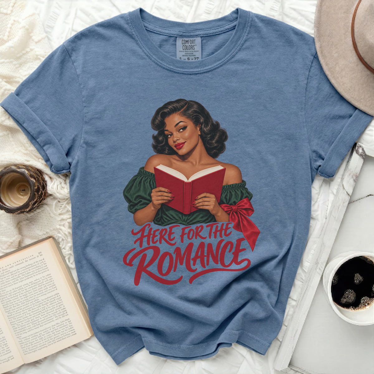 Blue t-shirt with a vintage woman reading a book, text "Here for the Romance".