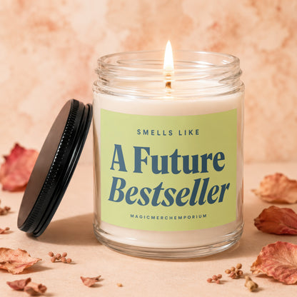 Lit candle in glass jar with "A Future Bestseller" label and black lid.