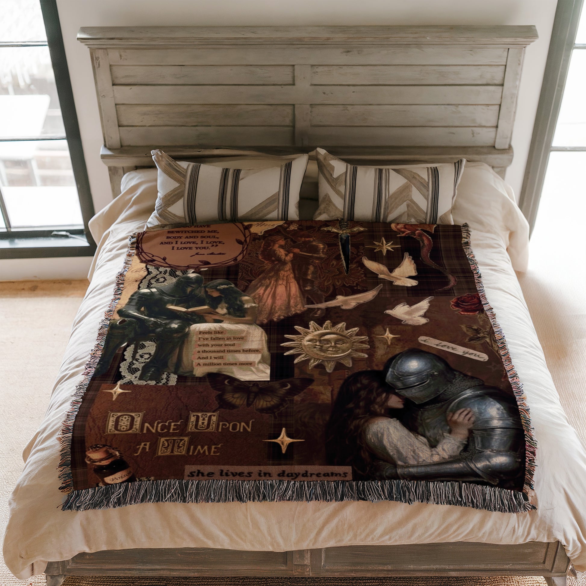 a bed with a blanket that has a collage of various images, including a knight in armor, a woman, and other fantastical elements.