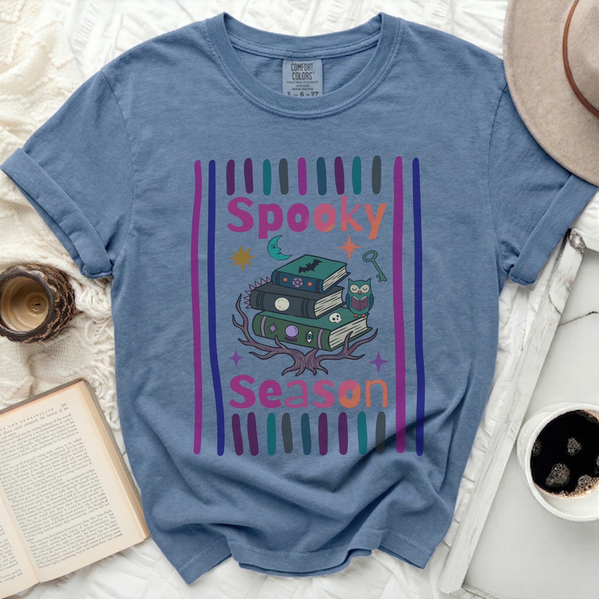 Blue t-shirt with "Spooky Season" text and Halloween graphics.