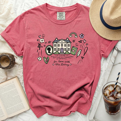 Pink t-shirt with Pride and Prejudice quote and house graphic.