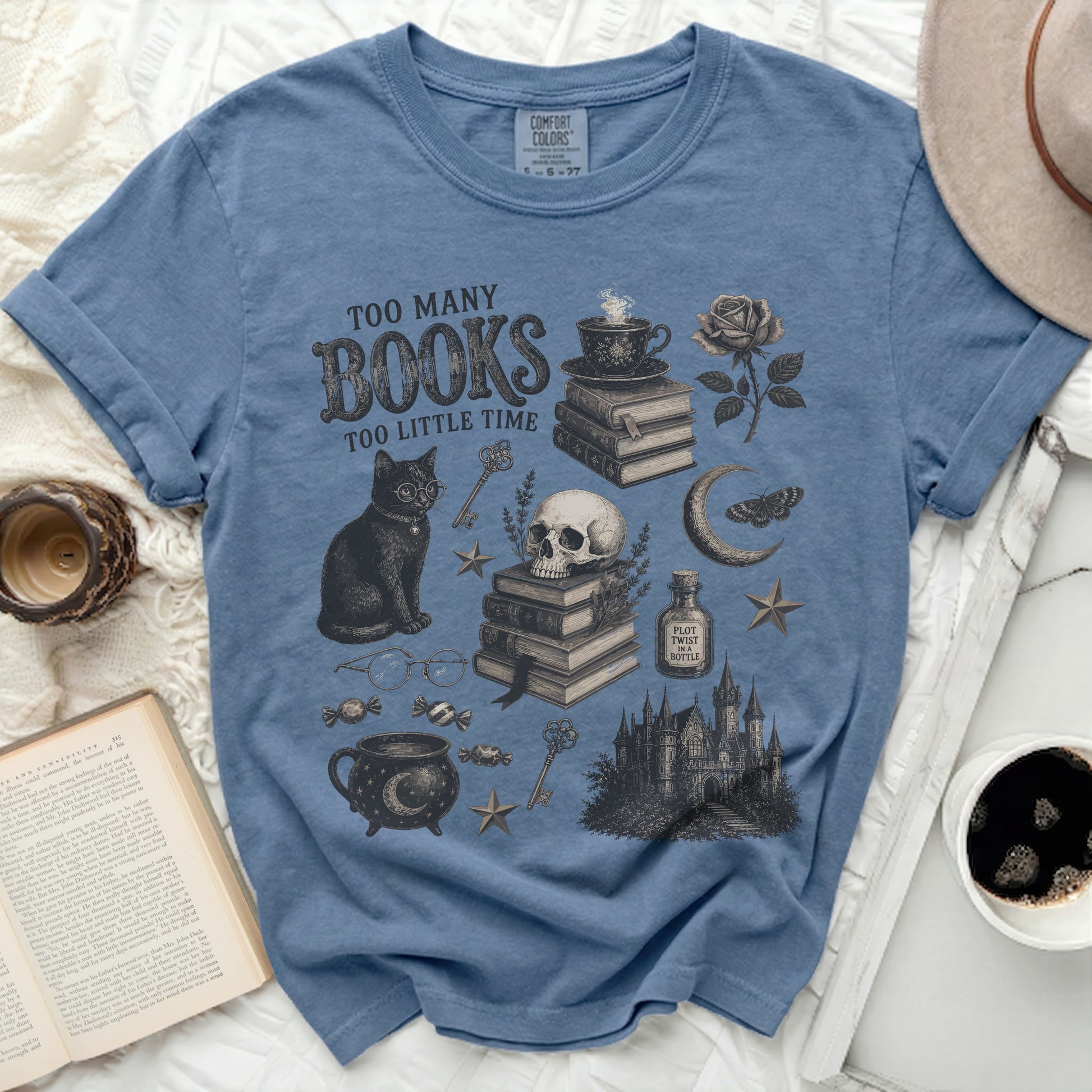 "Too Many Books Too Little Time" with illustrations of a black cat, books, skull, and castle.