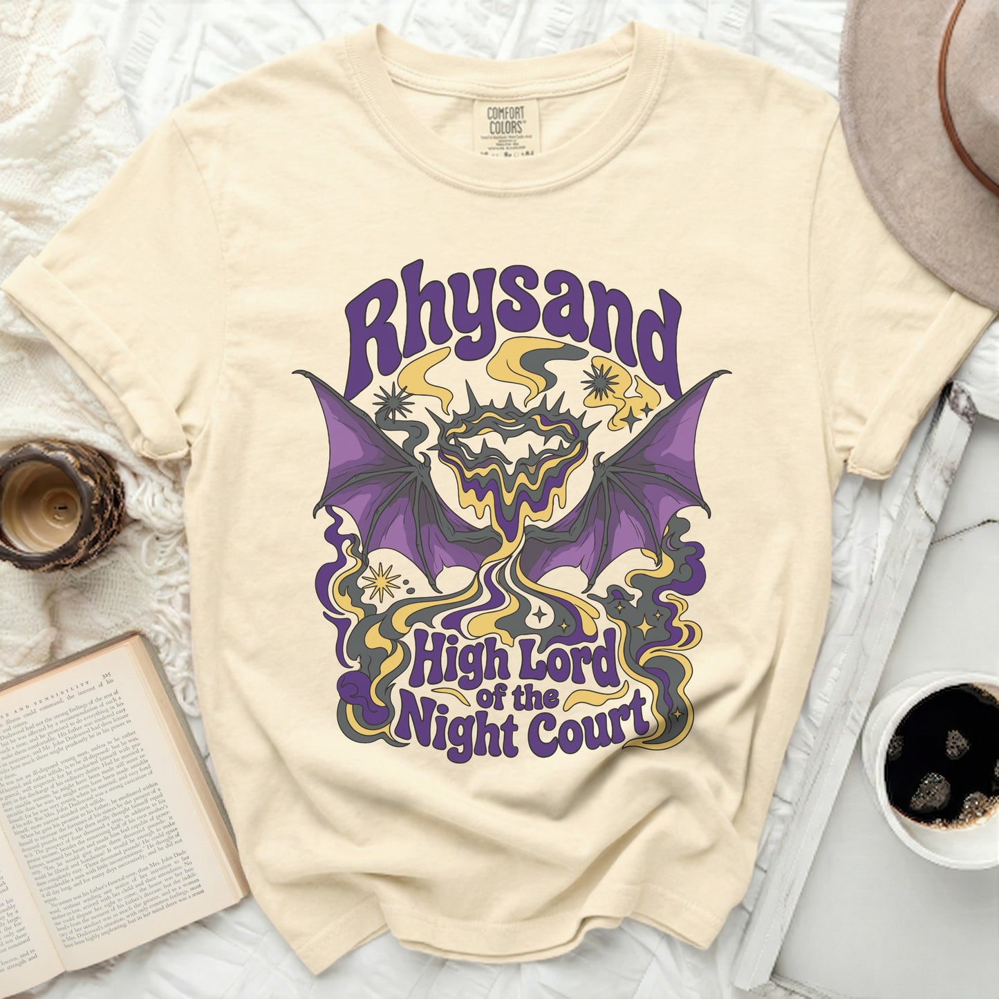 Cream t-shirt with "Rhysand High Lord of the Night Court" graphic.