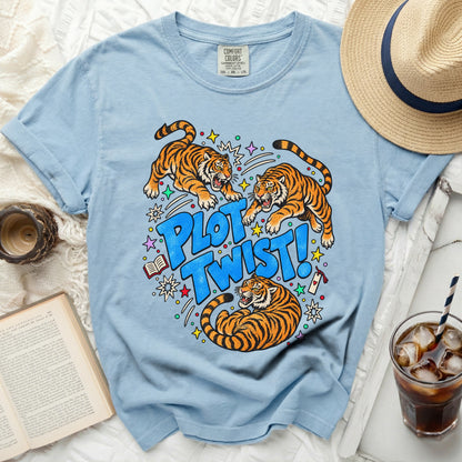 Blue t-shirt with graphic of three tigers and text "PLOT TWIST!".