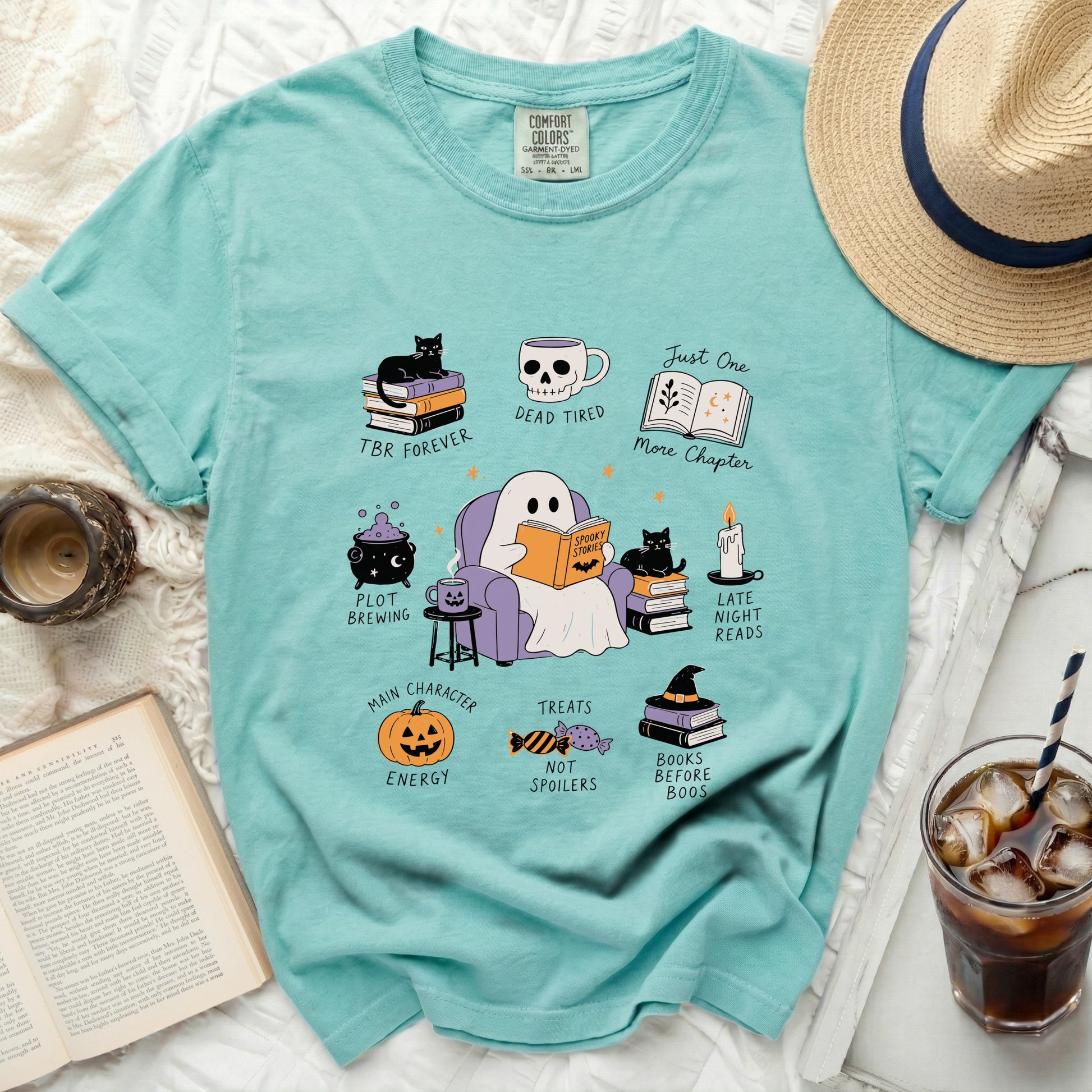 Ghost reading "Spooky Stories" surrounded by Halloween books and treats.
