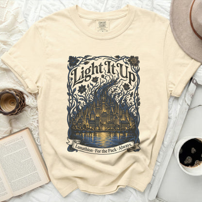Cream t-shirt with "Light It Up" and "Lunathion. For the Pack. Always." text.