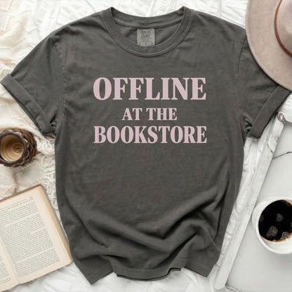 Charcoal grey t-shirt with pink text "Offline at the Bookstore"