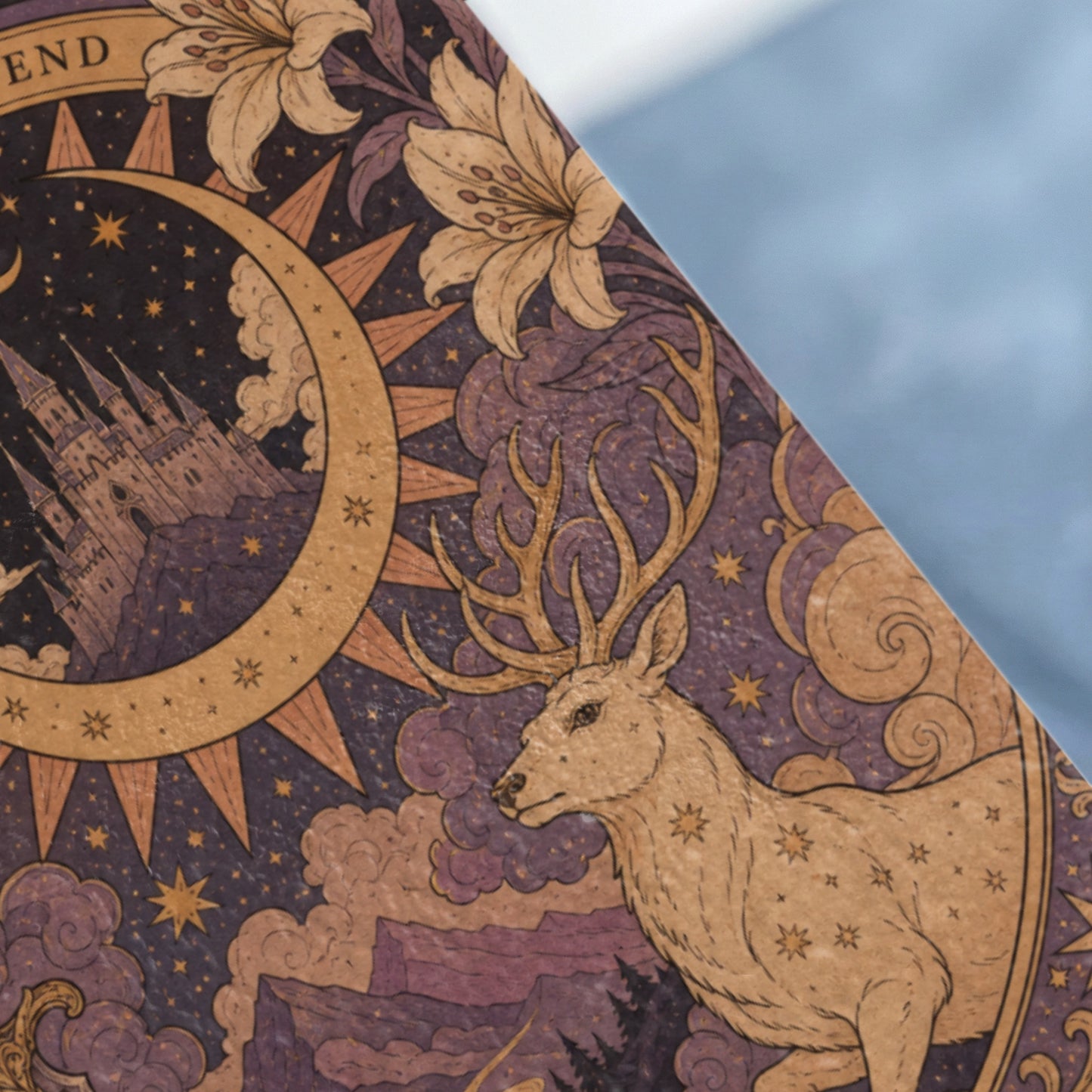Stag with antlers superimposed on a starry night sky with a castle and lilies.