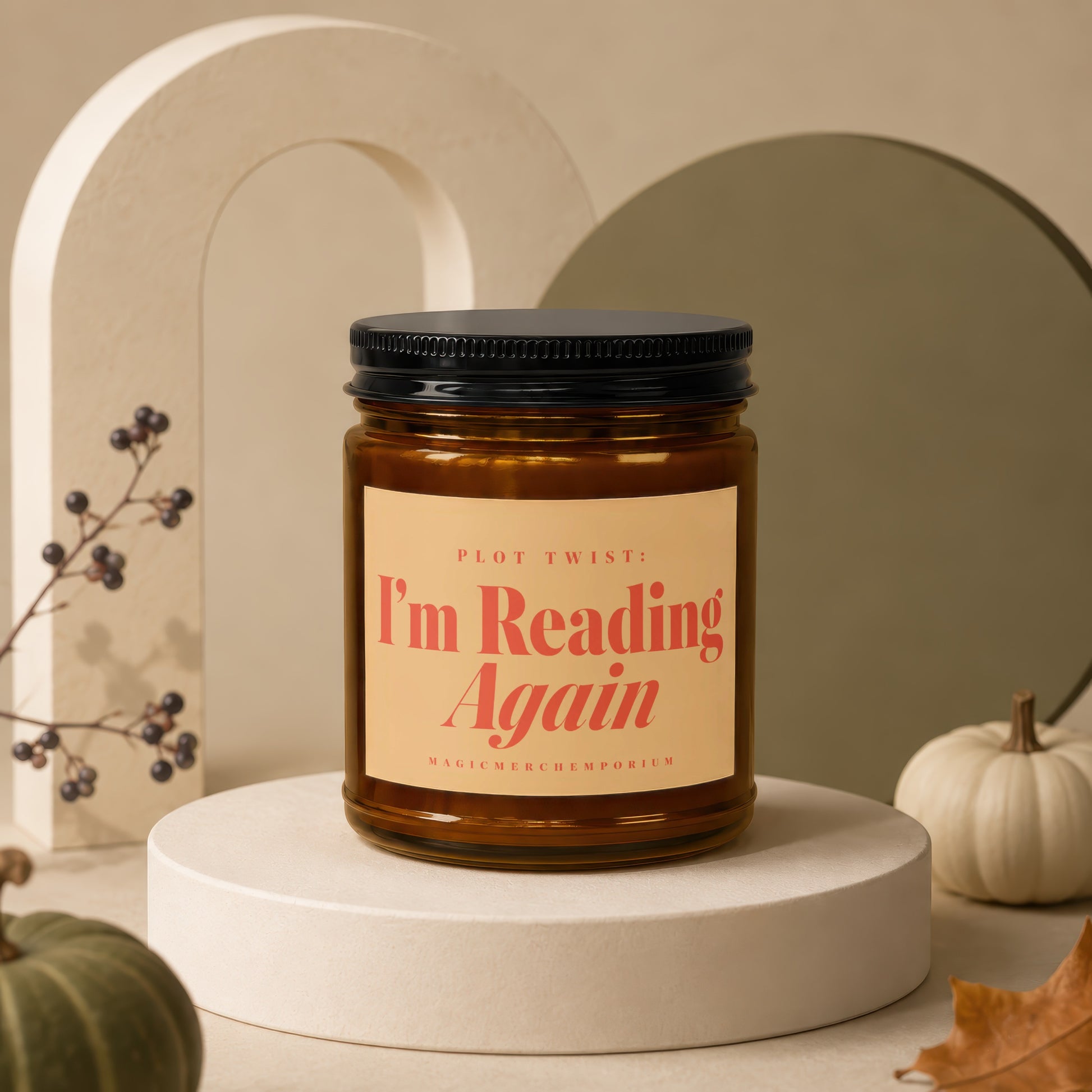 Amber candle with label reading "PLOT TWIST: I'm Reading Again".