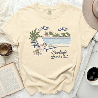 Cream t-shirt with "Poolside Book Club" graphic and pool scene.