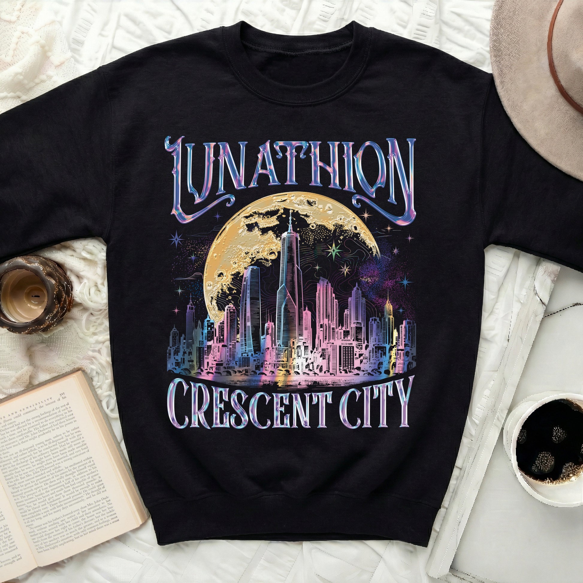 Black sweatshirt with "Lunathion Crescent City" text and a colorful cityscape design.