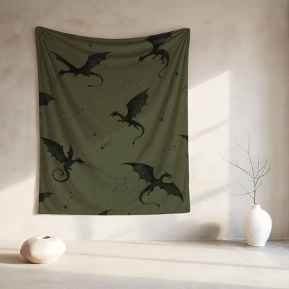 Green tapestry with a repeating pattern of black dragons and constellations.