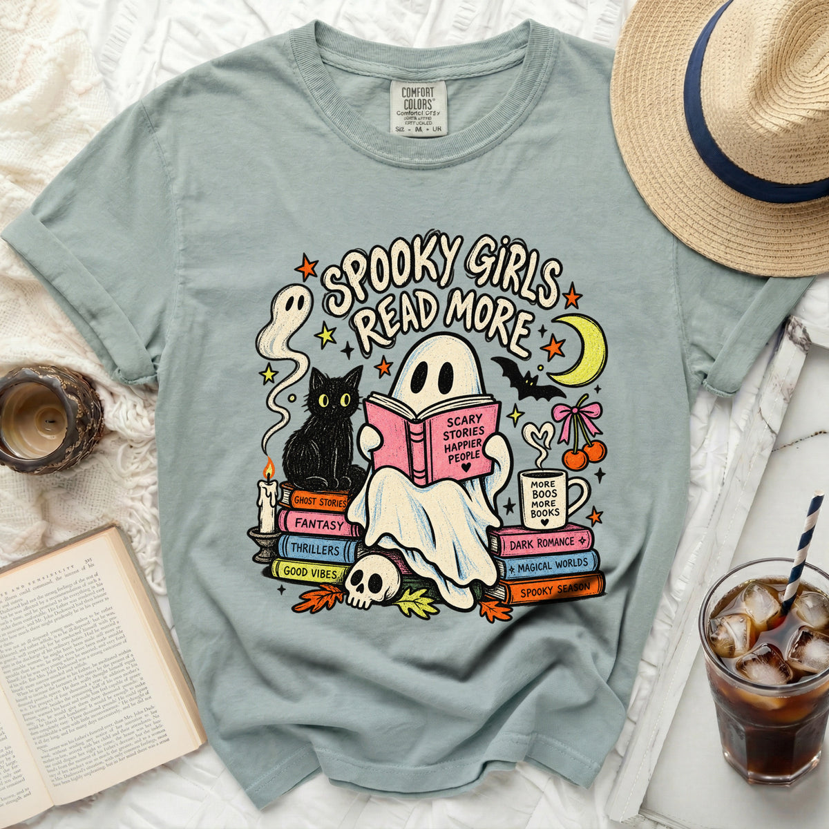 "Spooky Girls Read More" graphic t-shirt with ghost, cat, and books.