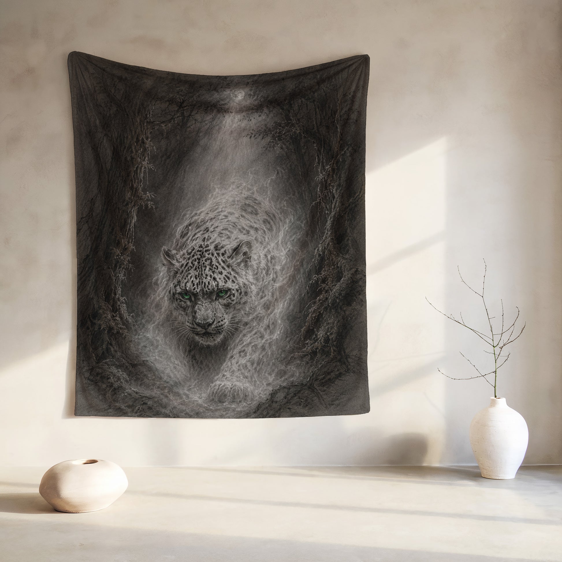 Monochromatic tapestry of a leopard with green eyes in a misty, wooded area under a full moon.