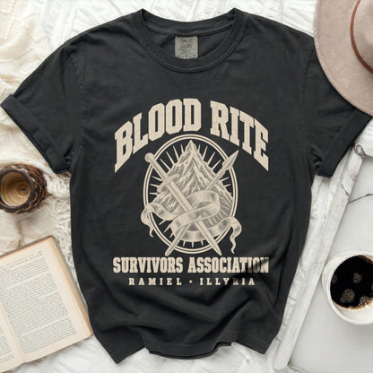 Black crewneck t-shirt featuring a vintage graphic with crossed swords, a mountain, and Blood Rite Survivors Association text.