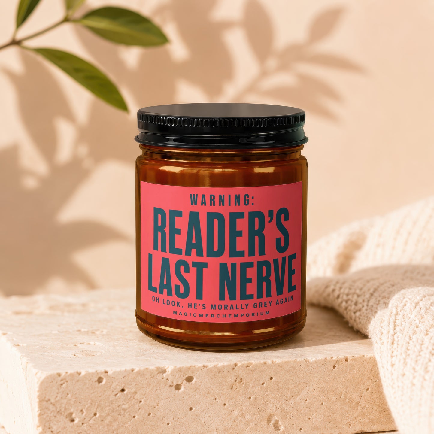 Candle with "Reader's Last Nerve" warning label, sitting on a stone block.