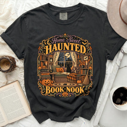 Dark t-shirt with "Home Sweet Haunted Book Nook" Halloween graphic.