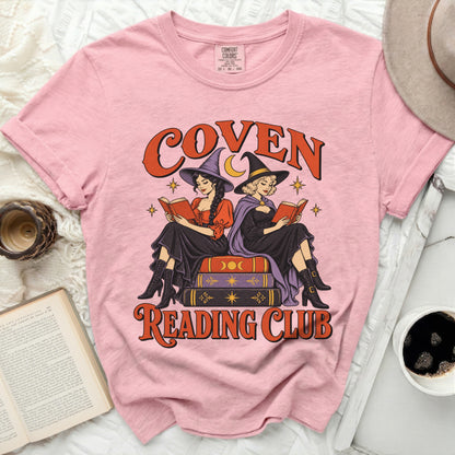 Pink t-shirt with "Coven Reading Club" text and two witches reading books.