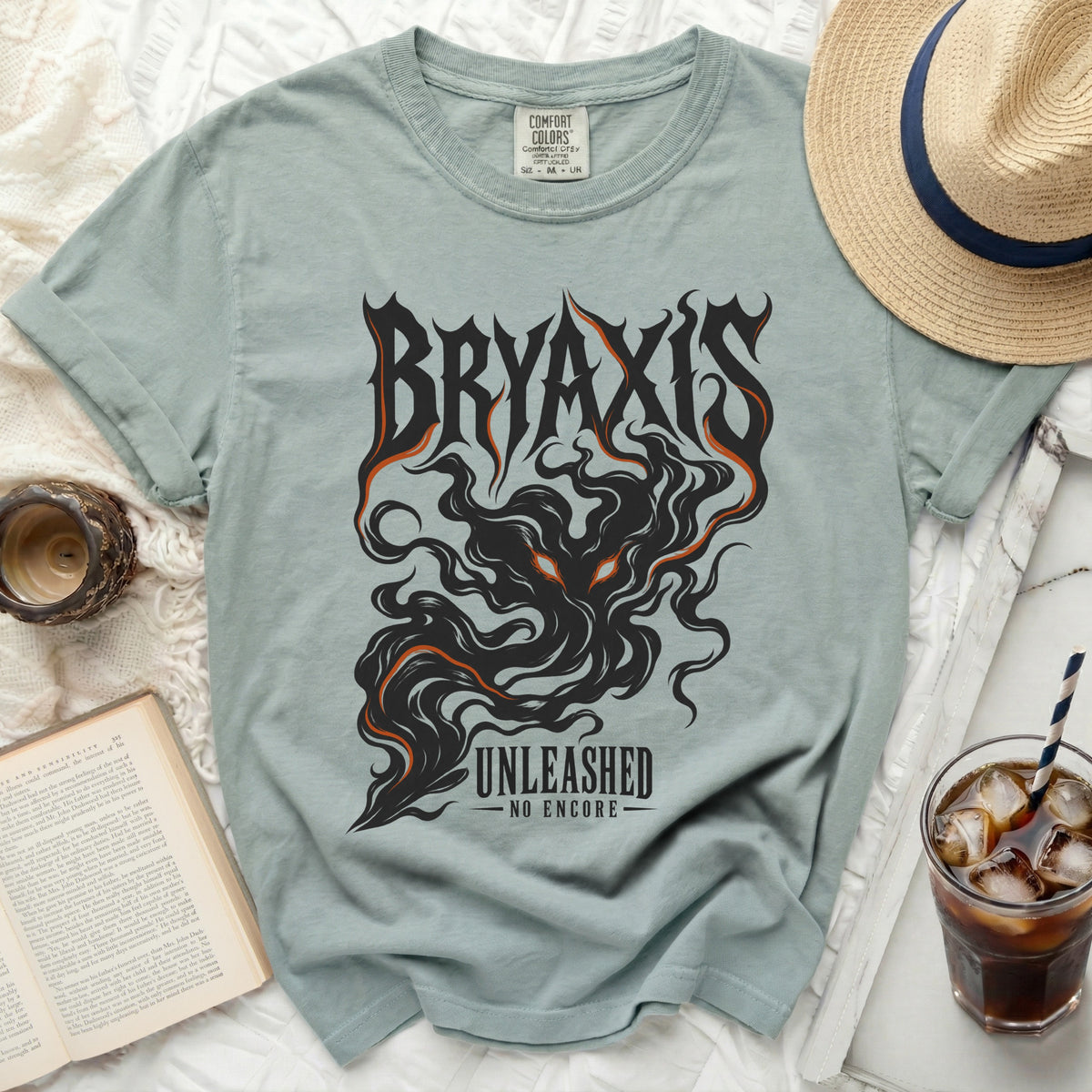 Light green t-shirt with black and orange "BRYAXIS UNLEASHED NO ENCORE" graphic.
