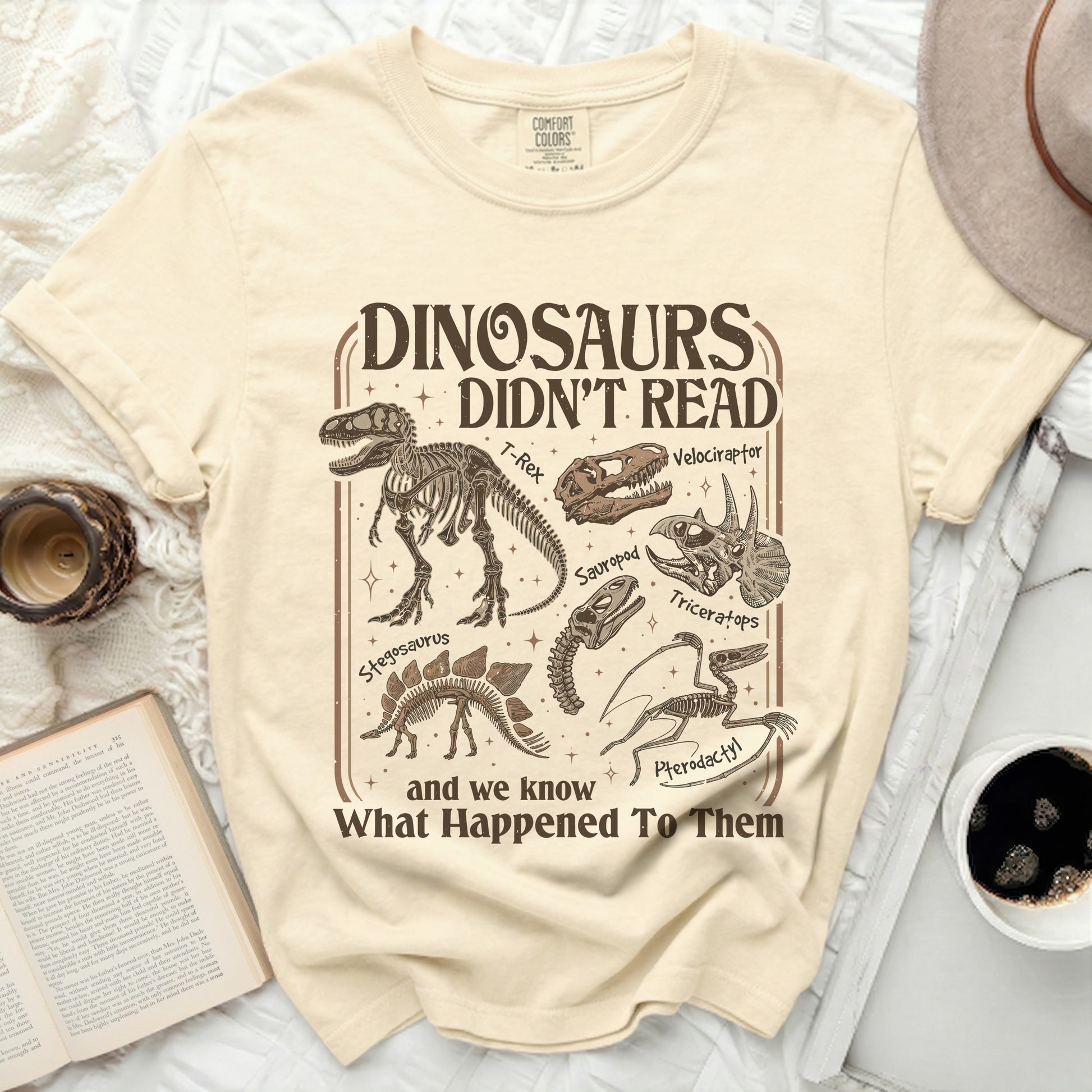 Dinosaurs didn't read and we know what happened to them graphic tee.