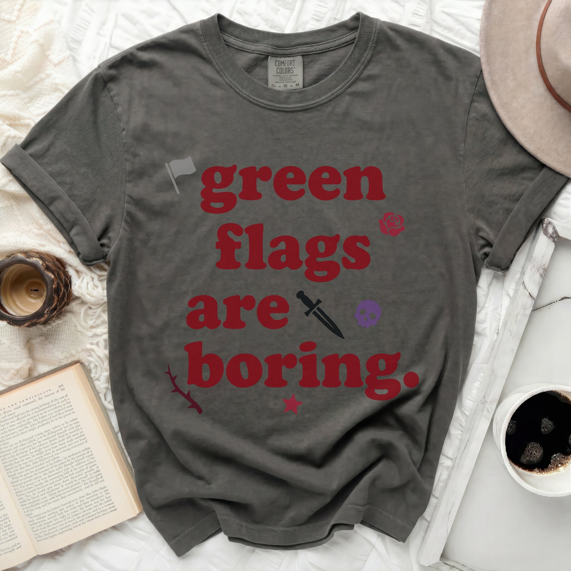 Gray t-shirt with "green flags are boring" text and graphic icons.